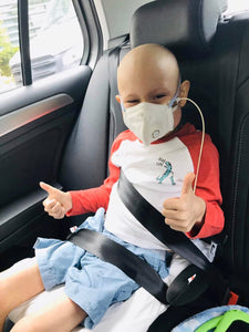 Brave boy, 6, who won the nation’s heart as he battled leukaemia gives a thumbs up after being discharged from hospital